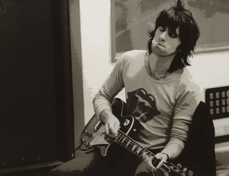 man playing electric guitar