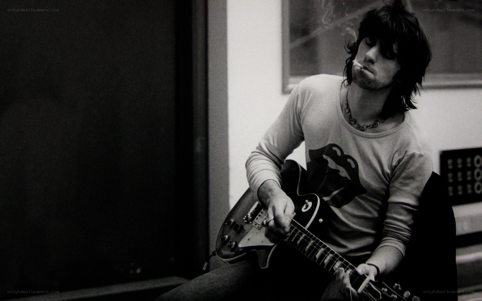 man playing electric guitar