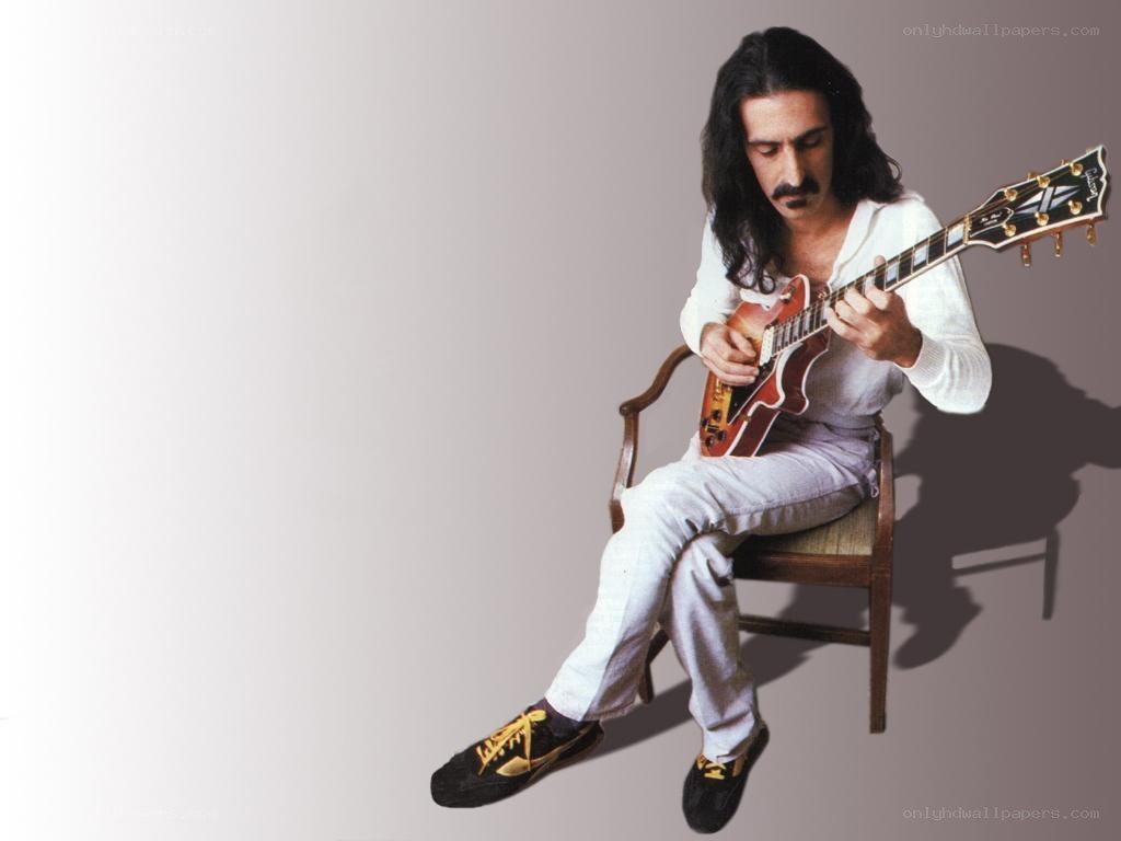 man playing electric guitar