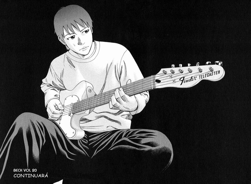 man playing electric guitar