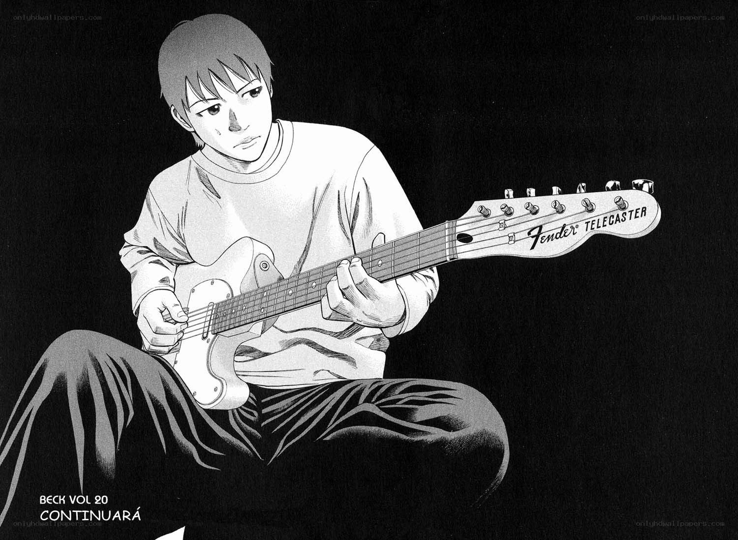 man playing electric guitar