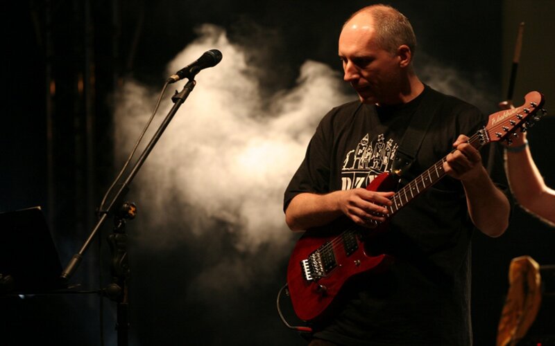 Man Playing Electric Guitar — Black, Dramatic, Night, Photograph, Microphone