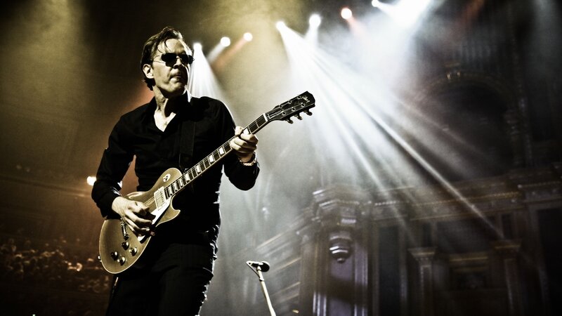 Man Playing Electric Guitar — Black, Dramatic, Night, Photograph, Stage Lights