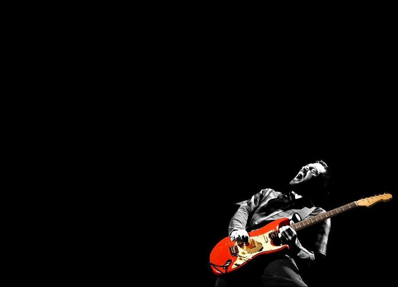 Man Playing Electric Guitar — Black, Dramatic, Photograph, Stage Light