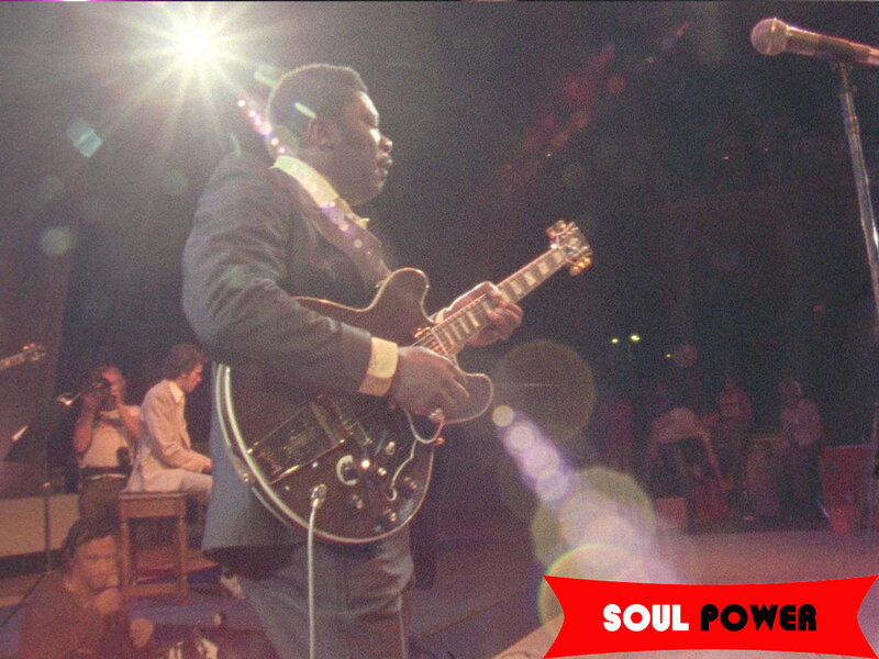 Man Playing Electric Guitar — Black, Dramatic