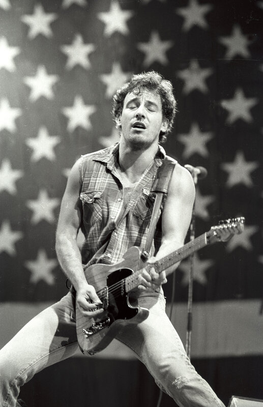 Man Playing Electric Guitar — Black, Energetic, Photograph, American Flag