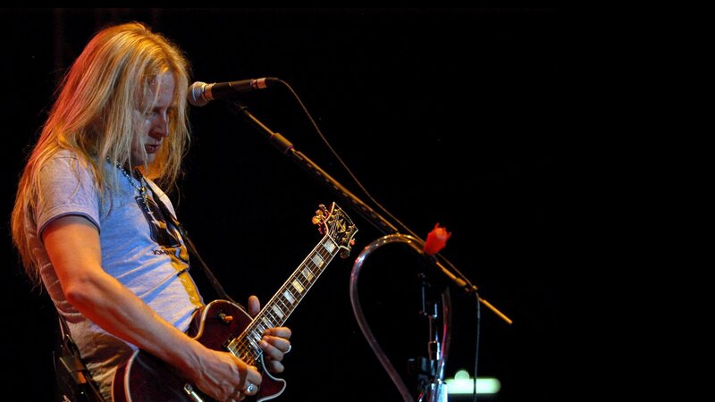 Man Playing Electric Guitar — Black, Focused, Night, Photograph, Microphone