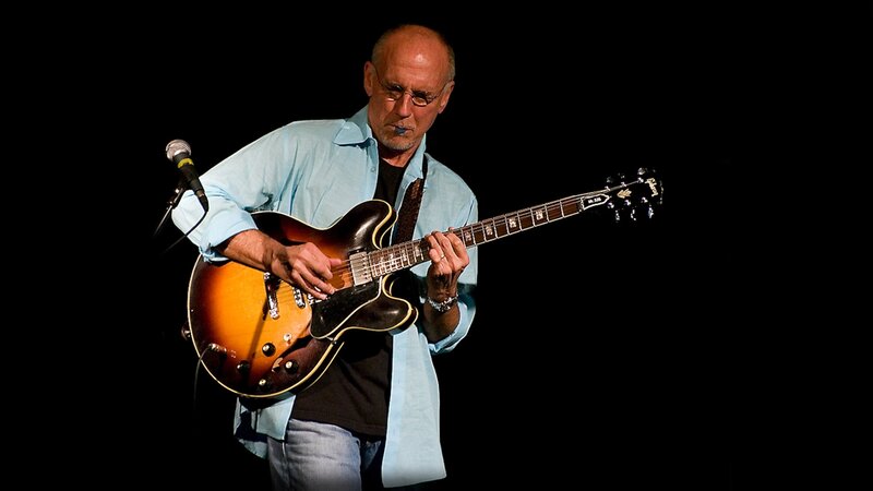 Man Playing Electric Guitar — Black, Focused, Photograph, Microphone