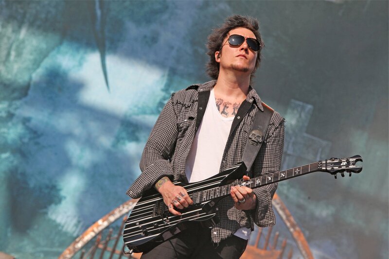 Man Playing Electric Guitar — Black, Intense, Afternoon
