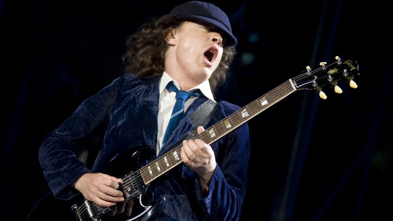 Man Playing Electric Guitar — Blue, Energetic, Night