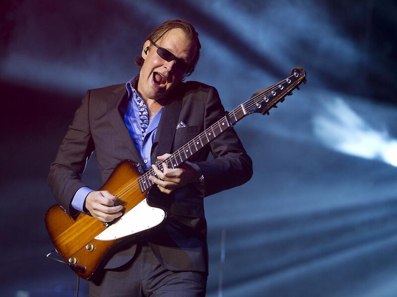 Man Playing Electric Guitar — Blue, Energetic
