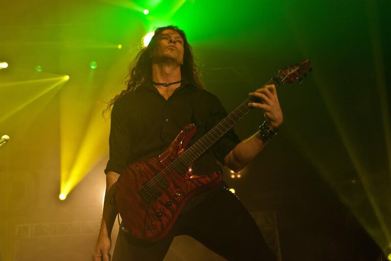 Man Playing Electric Guitar — Green, Dramatic