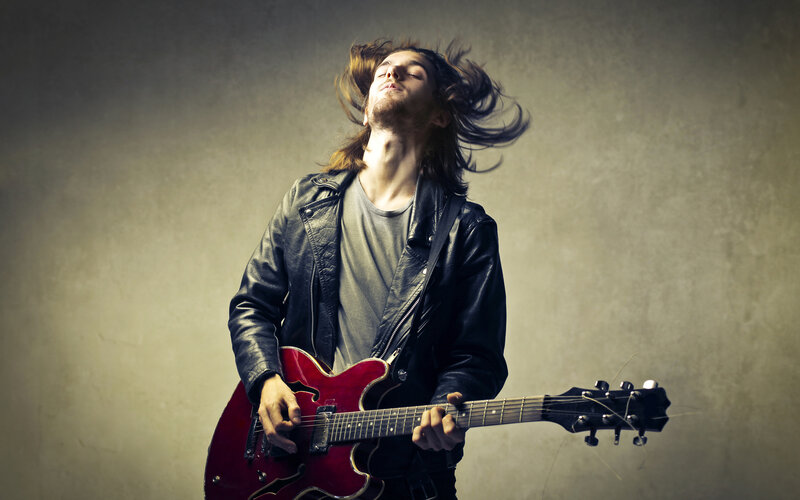 Man Playing Electric Guitar — Red, Dramatic, Photograph