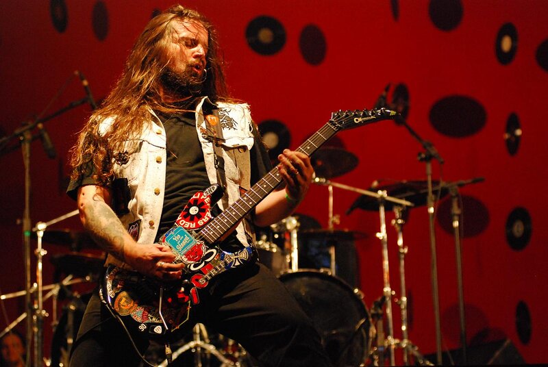 Man Playing Electric Guitar — Red, Energetic