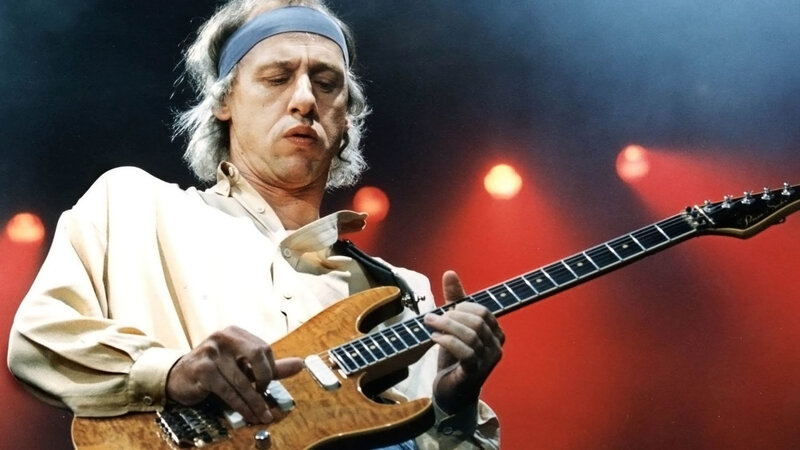 Man Playing Electric Guitar — Red, Intense