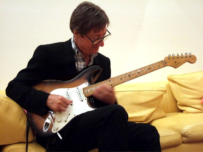 Man Playing Electric Guitar — Yellow