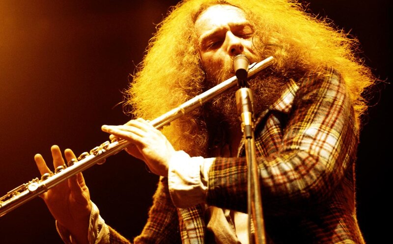 Man Playing Flute — Yellow
