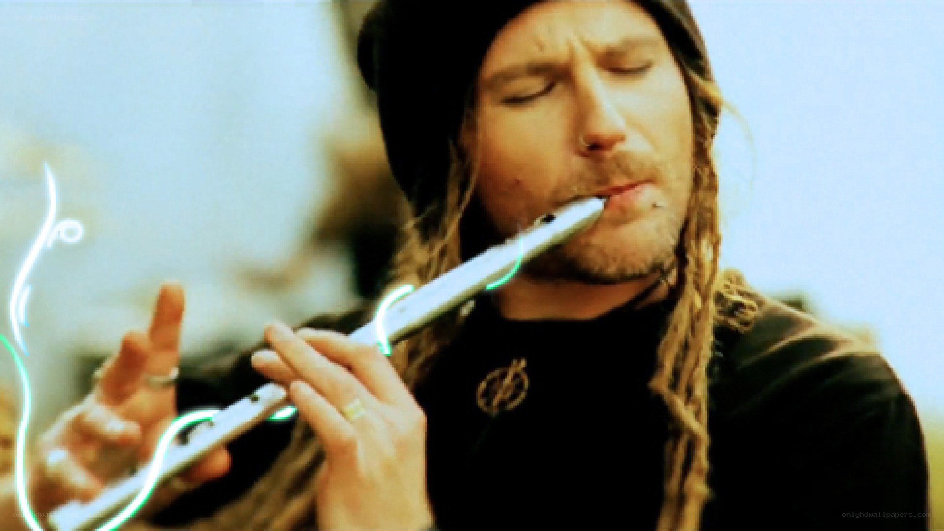 man playing flute