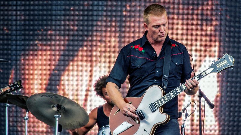 Man Playing Guitar — Black, Energetic, Photograph, Drum Kit
