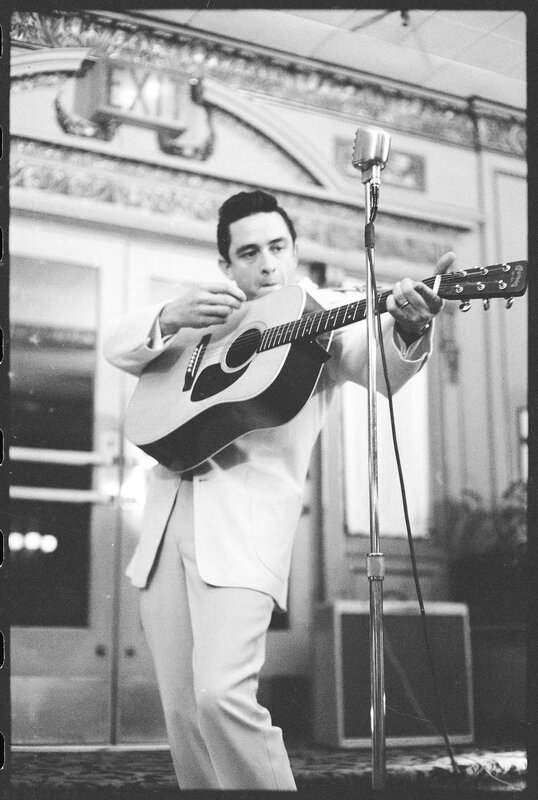 Man Playing Guitar — Black, Focused, Photograph, Microphone, Suit