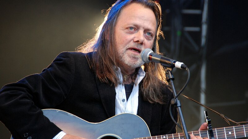Man Playing Guitar — Black, Performing, Photograph, Microphone, Stage