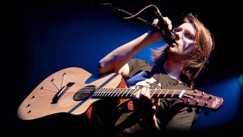 Man Playing Guitar — Blue, Dramatic, Night, Photograph, Microphone, Glasses