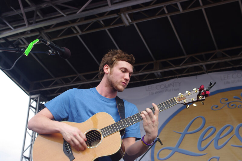 Man Playing Guitar — Blue, Focused