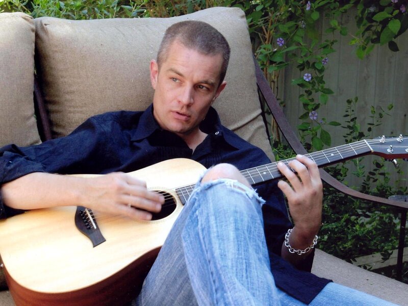 Man Playing Guitar — Blue, Relaxed, Afternoon