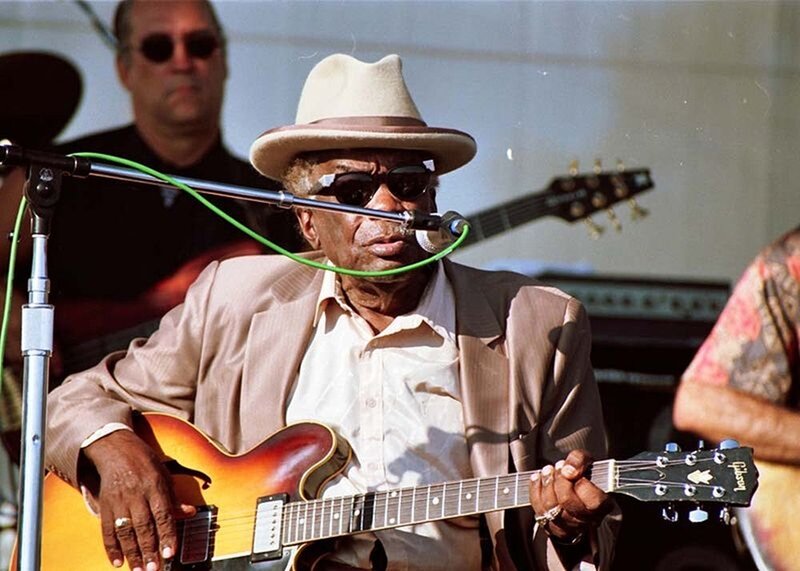 Man Playing Guitar — Brown, Focused, Photograph
