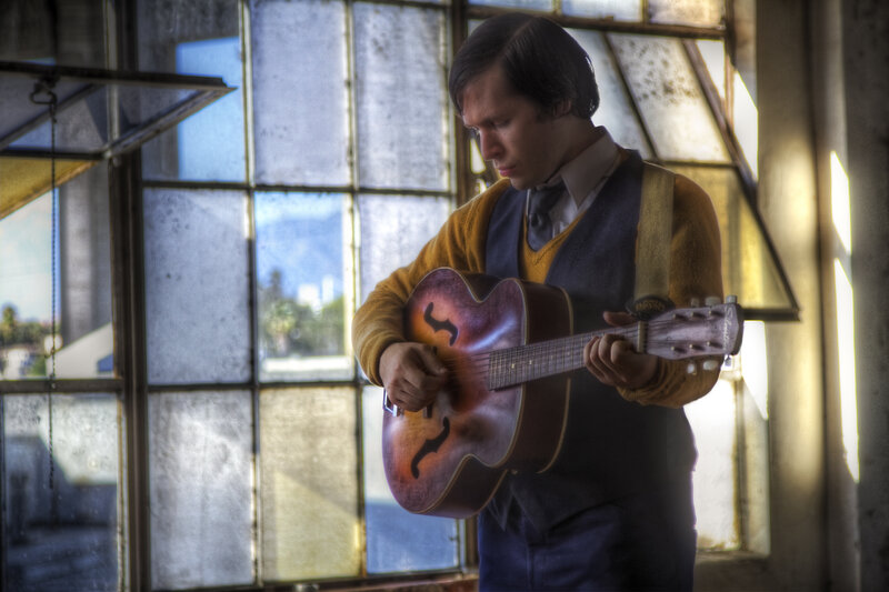 Man Playing Guitar — Brown