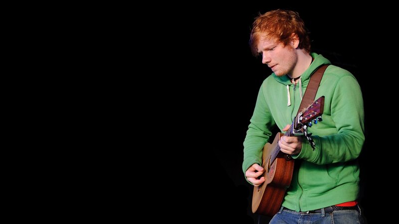 Man Playing Guitar — Green, Focused
