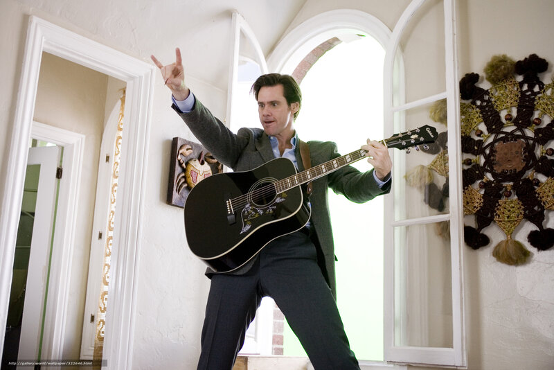 Man playing guitar in hallway