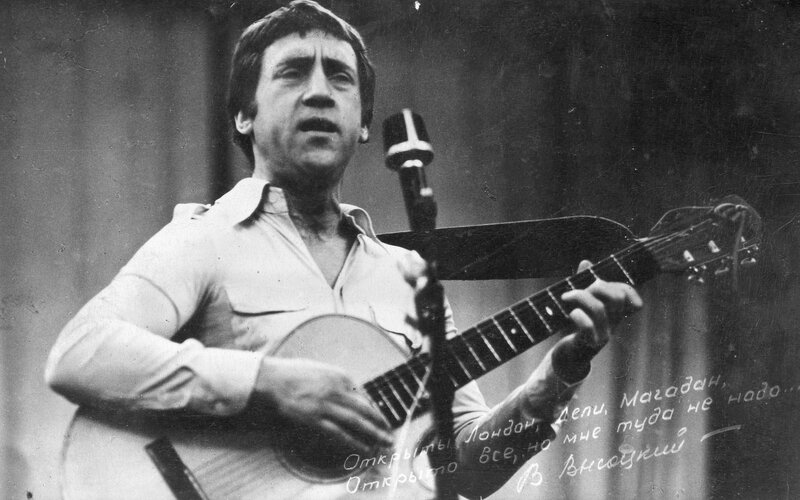 Man playing guitar on stage