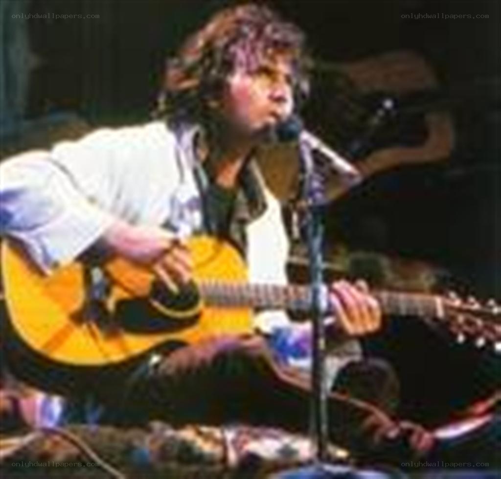 Man playing guitar on stage