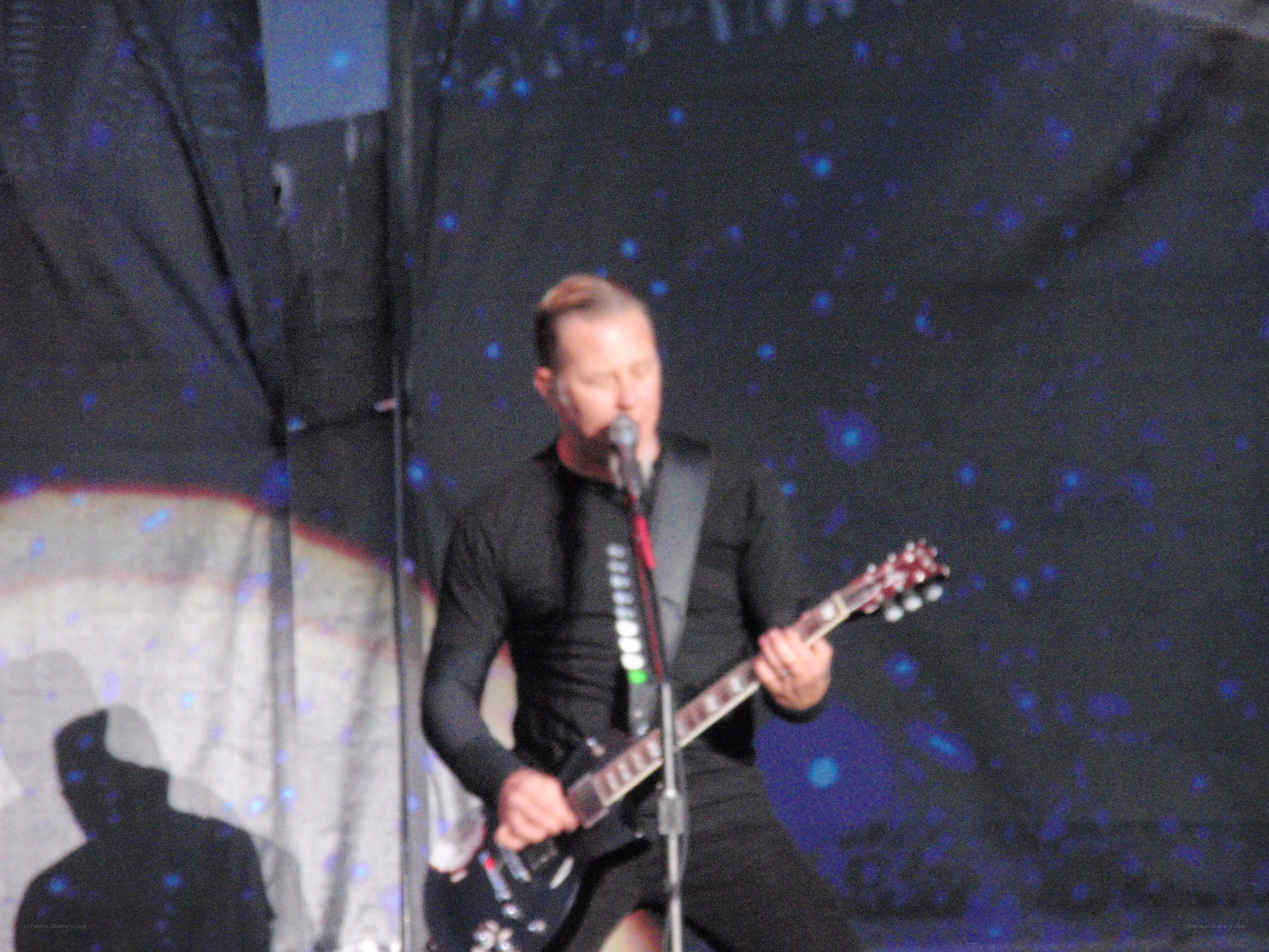 Man playing guitar on stage