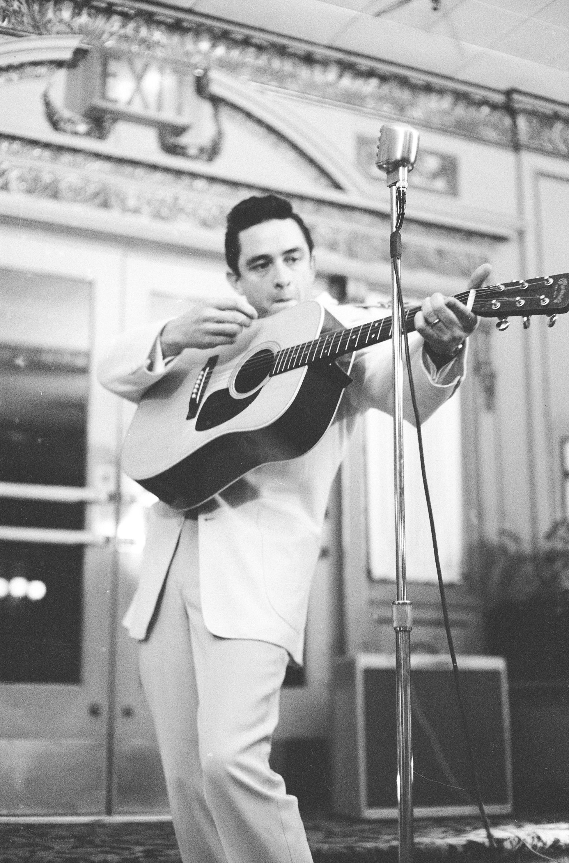 Man playing guitar on stage