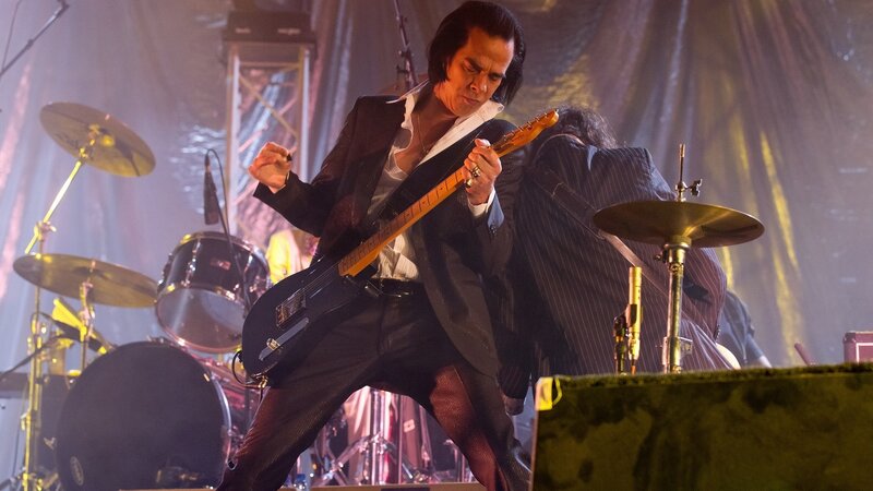 Man Playing Guitar on Stage — Black, Dramatic, Photograph