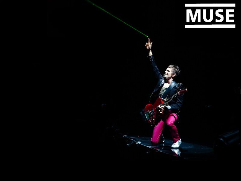 Man Playing Guitar on Stage — Black, Dramatic