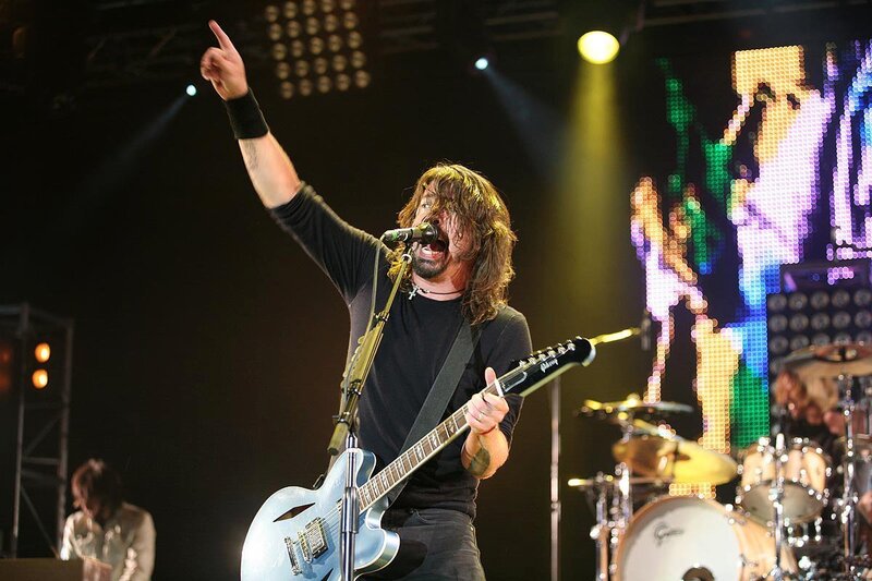 Man Playing Guitar on Stage — Black, Energetic, Night