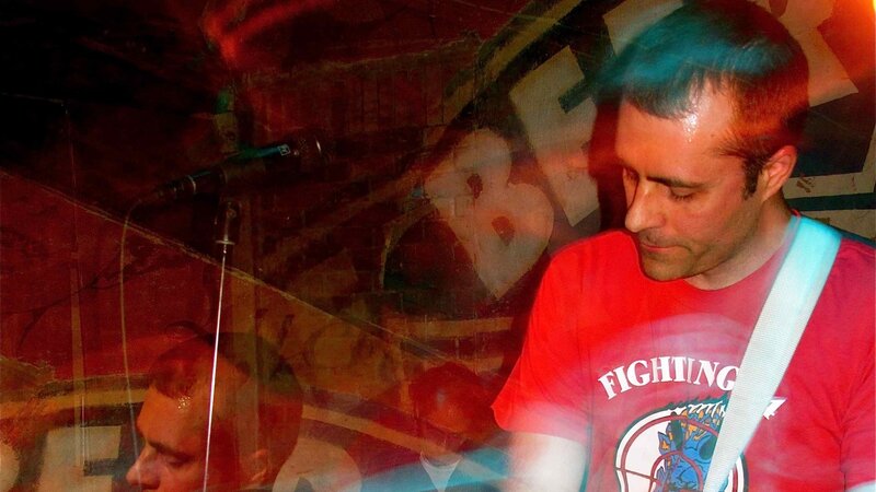 Man Playing Guitar — Red, Intense