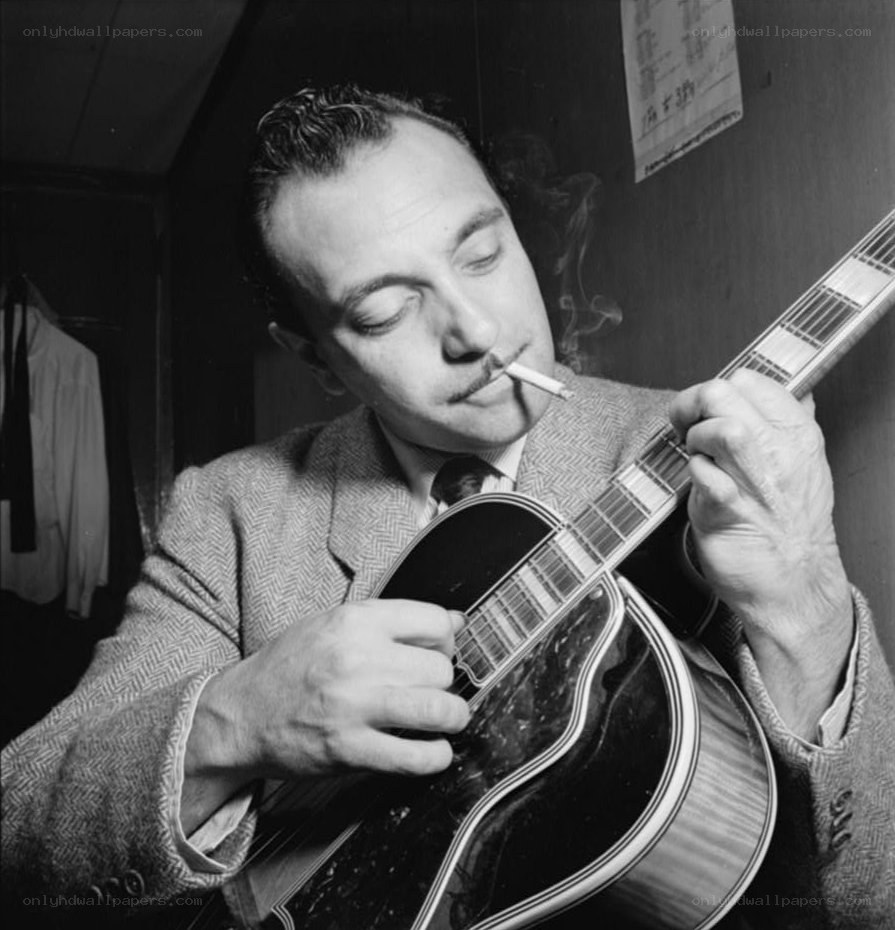 Man playing guitar with cigarette
