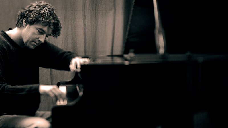 Man Playing Piano — Black, Focused, Photograph, Curly Hair