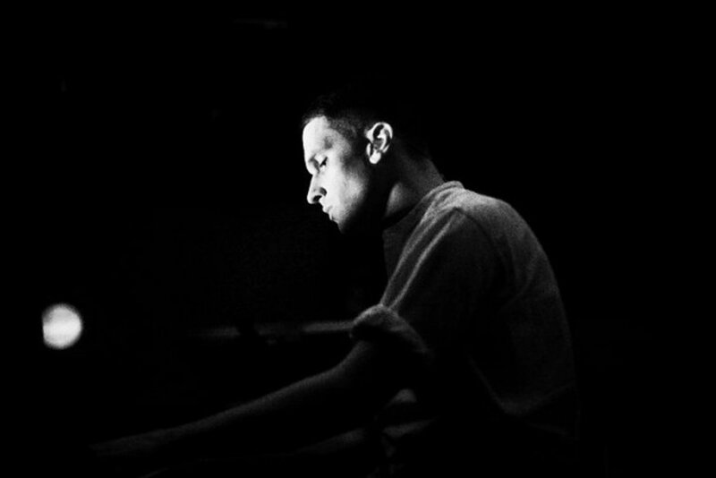 Man Playing Piano — Black