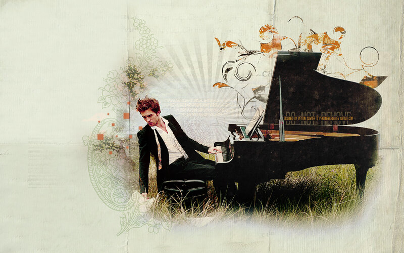 man playing piano in grass