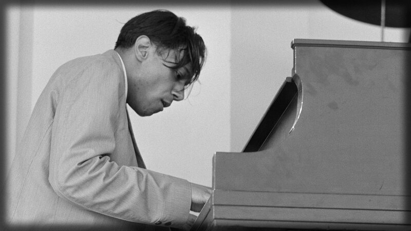 man playing piano