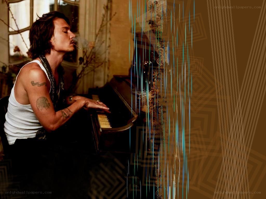 man playing piano with cigarette