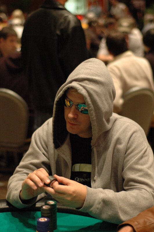 Man playing poker at table
