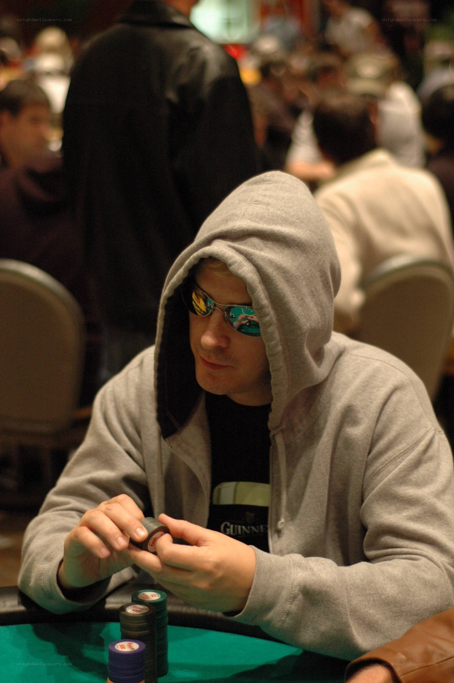 Man playing poker at table