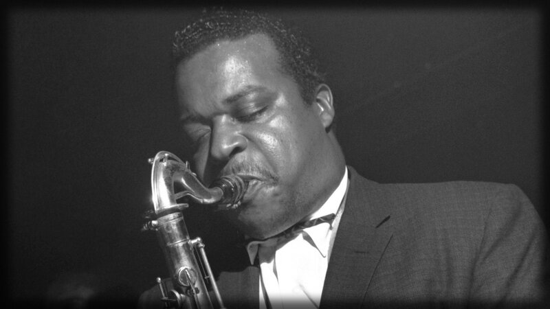 Man Playing Saxophone — Black