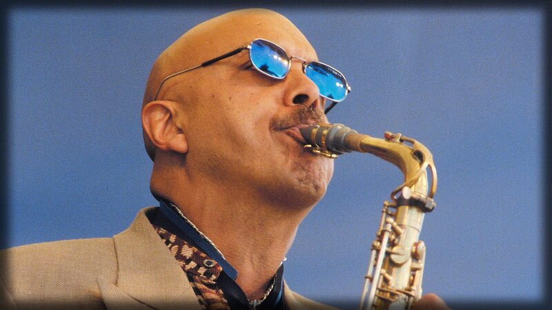 Man Playing Saxophone — Blue